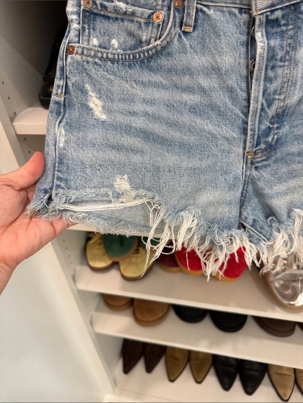 Agolde Light Wash Frayed Denim Cutoff Shorts